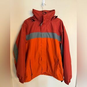 L.L. Bean Mountain Classic Rain Jacket in a pumpkin, gray, and orange color